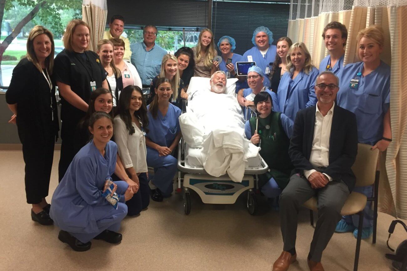 Twin Cities Pain Clinic team posing with first patient in the Midwest to receive the Intellis spinal cord stimulation system by Medtronic