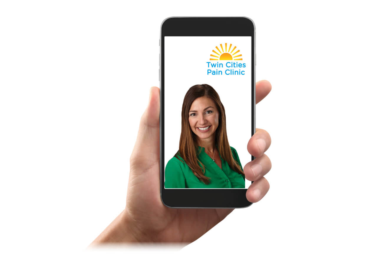 Telemedicine appointment on a mobile phone with Dr. Sherri Haas of Twin Cities Pain Clinic