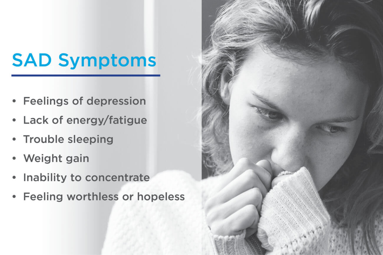 List of Symptoms of Seasonal Affective Disorder in Front of Female Looking Depressed