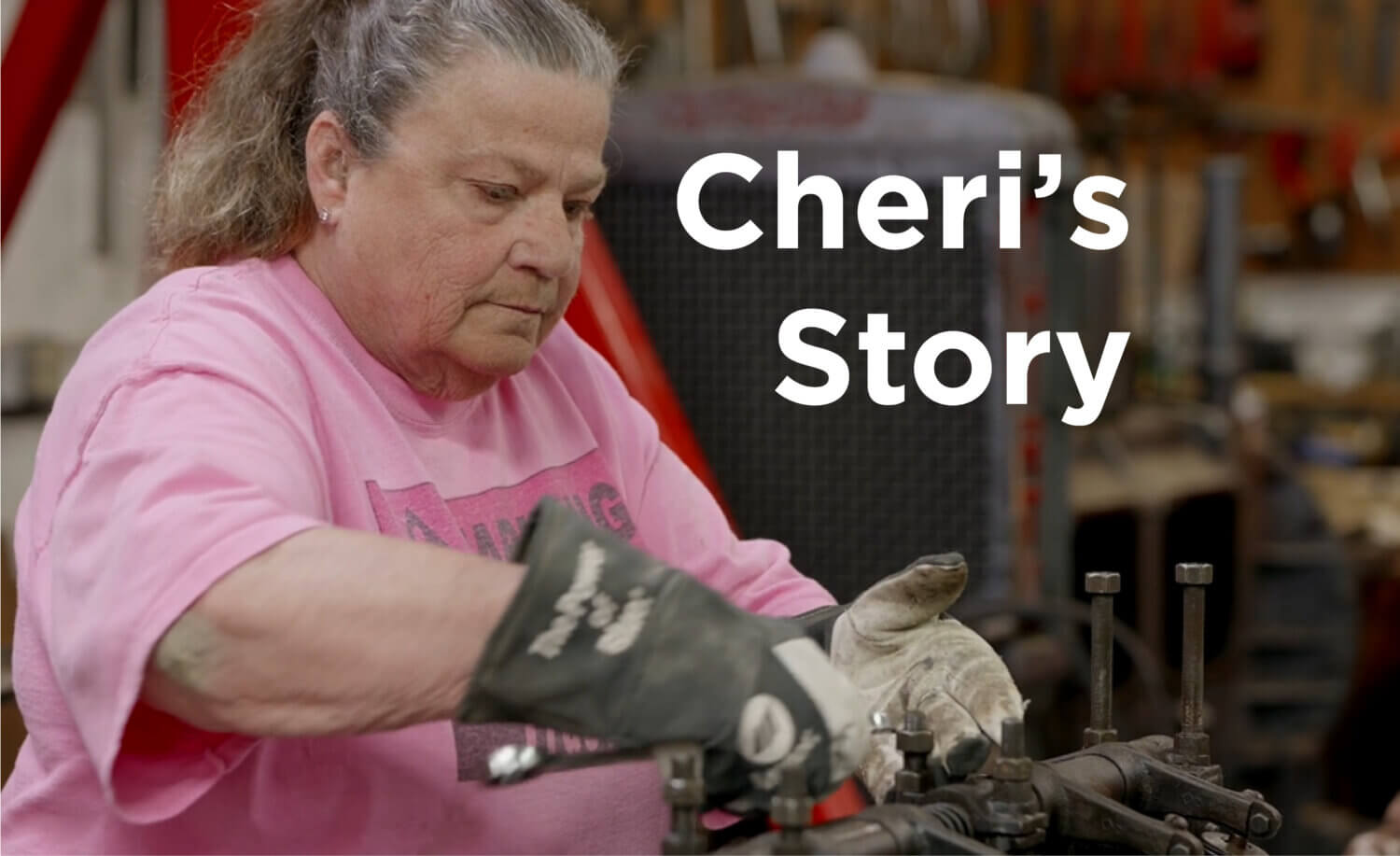 Intrathecal pump patient Cheri Haberle performing maintenance on an antique tractor engine