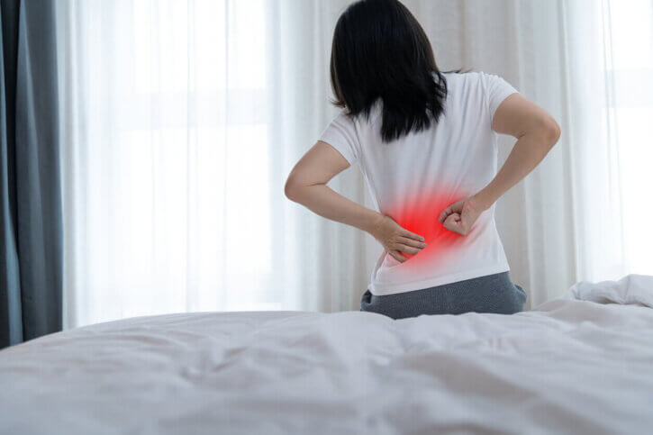 woman with back pain.